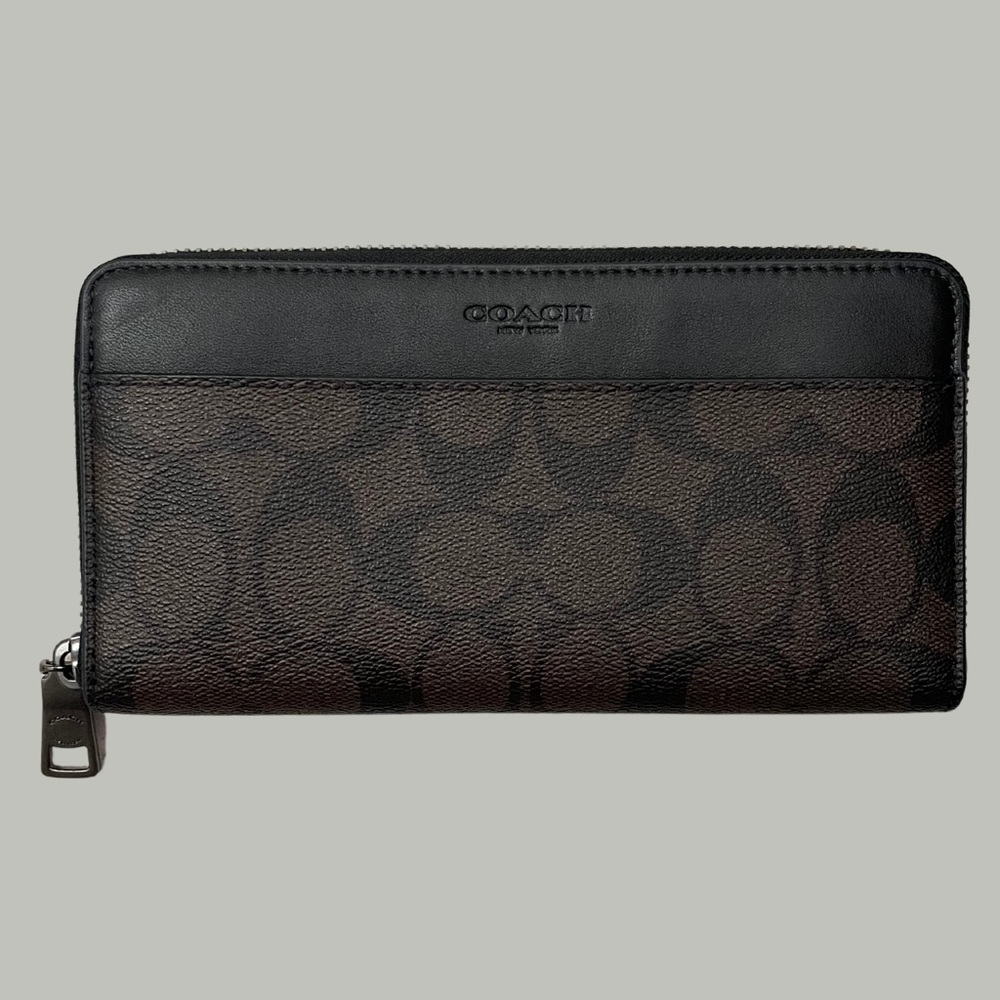 New with no tags never used Coach Signature Canvas Accordion Wallet.